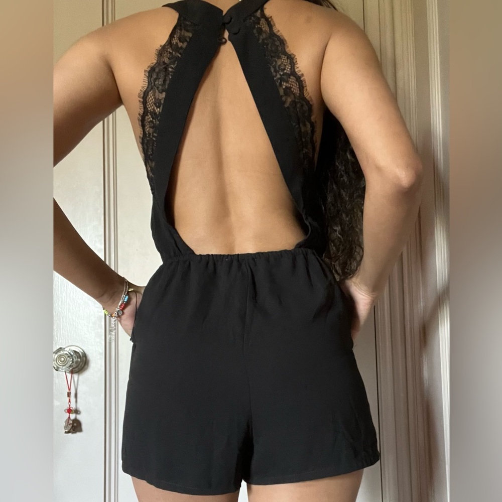 Forever 21 Backless Black Romper/ shorts jumpsuit with pockets